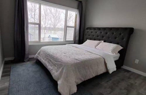 1464 Livingston Way Ne, Calgary, AB - Indoor Photo Showing Bedroom