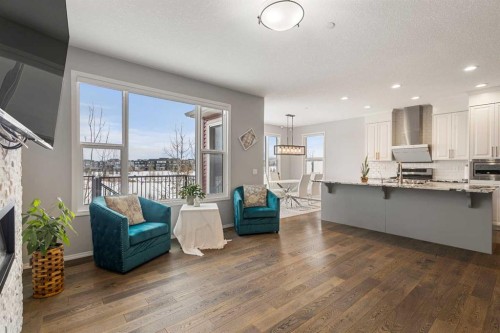 1464 Livingston Way Ne, Calgary, AB - Indoor With Fireplace