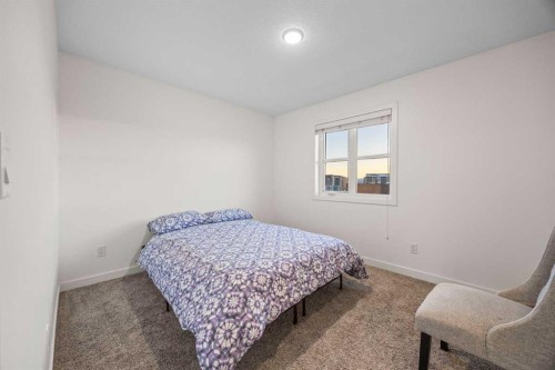 87 Walden Path Se, Calgary, AB - Indoor Photo Showing Bedroom