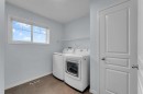 20 Copperpond Grove Se, Calgary, AB  - Indoor Photo Showing Laundry Room 