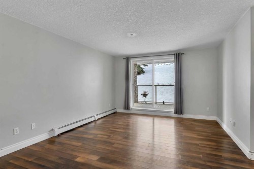 106-5500 Somervale Court Sw, Calgary, AB - Indoor Photo Showing Other Room