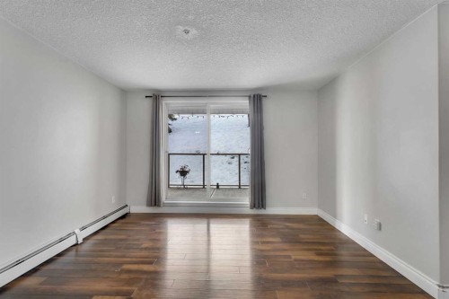 106-5500 Somervale Court Sw, Calgary, AB - Indoor Photo Showing Other Room