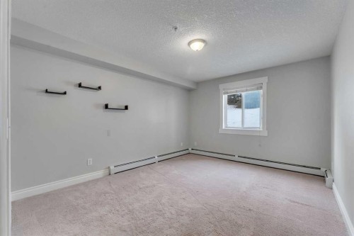 106-5500 Somervale Court Sw, Calgary, AB - Indoor Photo Showing Other Room