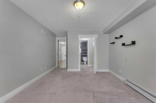 106-5500 Somervale Court Sw, Calgary, AB - Indoor Photo Showing Other Room