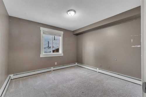 106-5500 Somervale Court Sw, Calgary, AB - Indoor Photo Showing Other Room