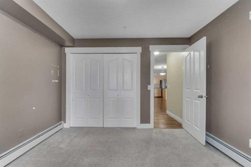 106-5500 Somervale Court Sw, Calgary, AB - Indoor Photo Showing Other Room