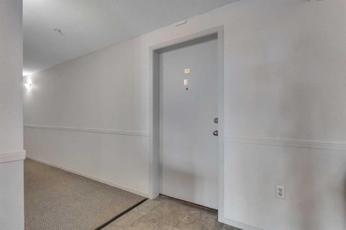 106-5500 Somervale Court Sw, Calgary, AB - Indoor Photo Showing Other Room
