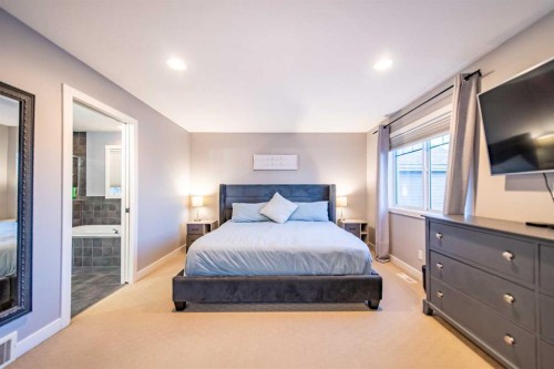 42 Copperfield Point Se, Calgary, AB - Indoor Photo Showing Bedroom
