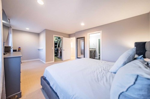 42 Copperfield Point Se, Calgary, AB - Indoor Photo Showing Bedroom