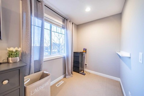 42 Copperfield Point Se, Calgary, AB - Indoor Photo Showing Other Room