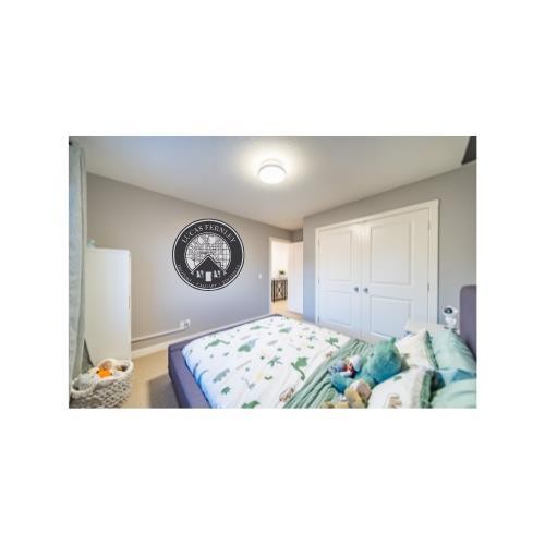 42 Copperfield Point Se, Calgary, AB - Indoor Photo Showing Bedroom