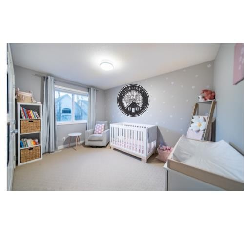 42 Copperfield Point Se, Calgary, AB - Indoor Photo Showing Bedroom