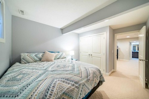 42 Copperfield Point Se, Calgary, AB - Indoor Photo Showing Bedroom