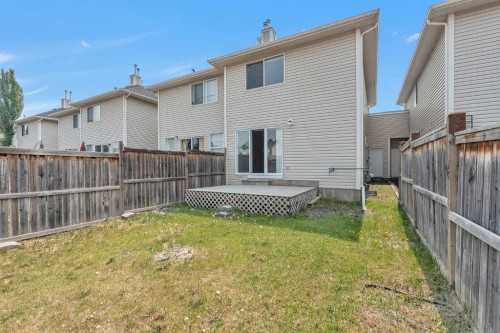 203 Cranberry Green Se, Calgary, AB - Outdoor With Deck Patio Veranda With Exterior