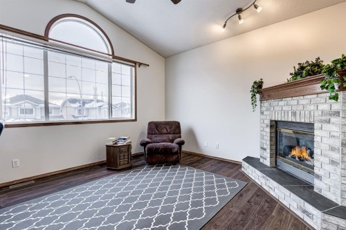 149 Coventry Court Ne, Calgary, AB - Indoor With Fireplace