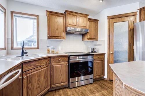 149 Coventry Court Ne, Calgary, AB - Indoor Photo Showing Kitchen With Double Sink