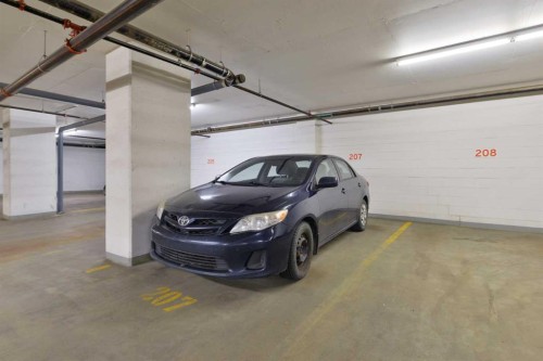 1110-615 6 Avenue Se, Calgary, AB - Indoor Photo Showing Garage