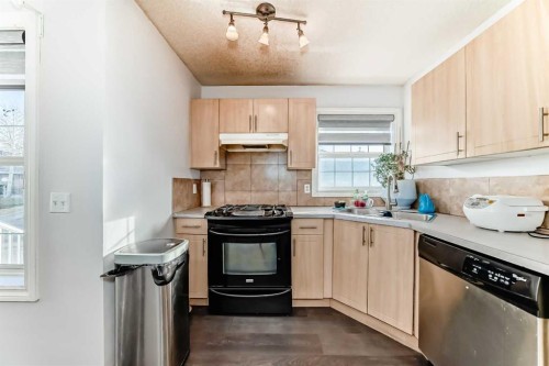 128-7707 Martha'S Haven Park Ne, Calgary, AB - Indoor Photo Showing Kitchen