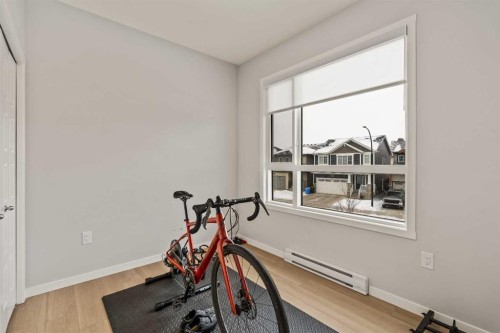 2201-33 Carringham Gate Nw, Calgary, AB - Indoor Photo Showing Gym Room