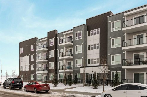 2201-33 Carringham Gate Nw, Calgary, AB - Outdoor With Balcony With Facade