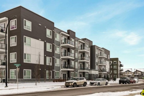 2201-33 Carringham Gate Nw, Calgary, AB - Outdoor With Balcony With Facade