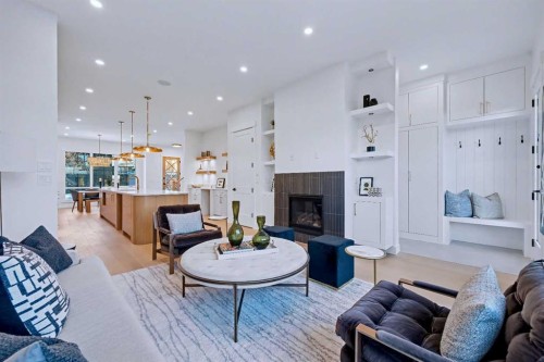 732 33A Street Nw, Calgary, AB - Indoor Photo Showing Living Room With Fireplace