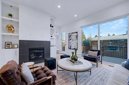 732 33A Street Nw, Calgary, AB - Indoor Photo Showing Living Room With Fireplace