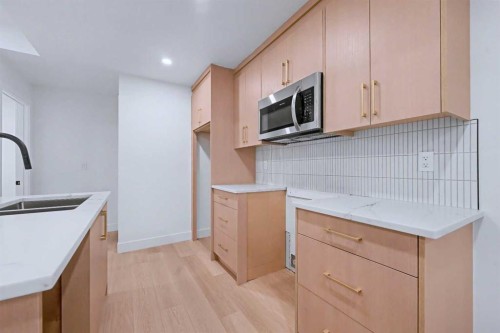 732 33A Street Nw, Calgary, AB - Indoor Photo Showing Kitchen With Double Sink