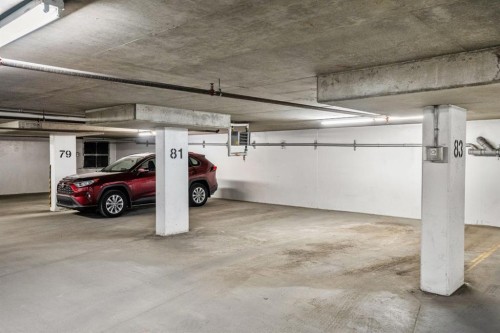 201-15233 1 Street Se, Calgary, AB - Indoor Photo Showing Garage