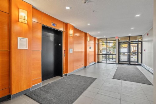 201-15233 1 Street Se, Calgary, AB - Indoor Photo Showing Other Room