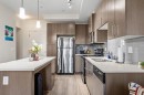 201-15233 1 Street Se, Calgary, AB  - Indoor Photo Showing Kitchen With Stainless Steel Kitchen With Upgraded Kitchen 