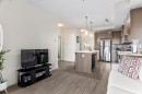 201-15233 1 Street Se, Calgary, AB  - Indoor Photo Showing Kitchen With Stainless Steel Kitchen 