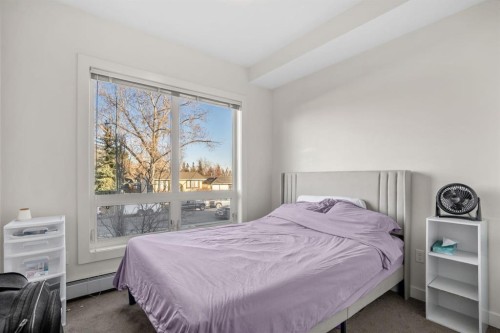 201-15233 1 Street Se, Calgary, AB - Indoor Photo Showing Bedroom
