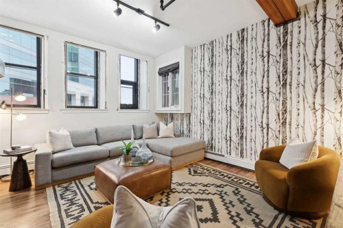316-220 11 Avenue Se, Calgary, AB - Indoor Photo Showing Living Room