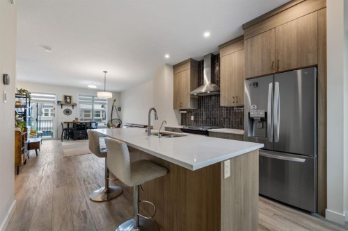 366 Seton Villas Se, Calgary, AB - Indoor Photo Showing Kitchen With Double Sink With Upgraded Kitchen