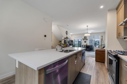 366 Seton Villas Se, Calgary, AB - Indoor Photo Showing Kitchen With Double Sink With Upgraded Kitchen