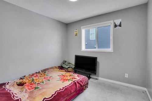 250 Martinwood Place Ne, Calgary, AB - Indoor Photo Showing Bedroom