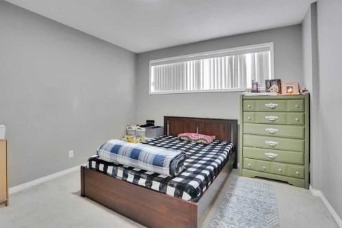 250 Martinwood Place Ne, Calgary, AB - Indoor Photo Showing Bedroom