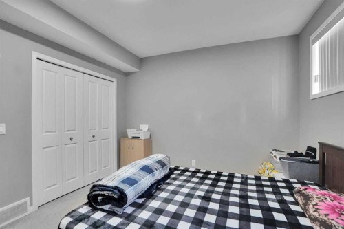 250 Martinwood Place Ne, Calgary, AB - Indoor Photo Showing Bedroom