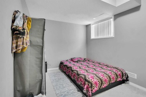 250 Martinwood Place Ne, Calgary, AB - Indoor Photo Showing Bedroom