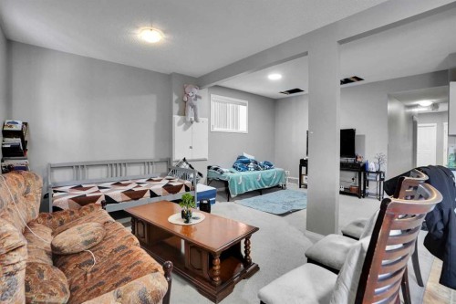 250 Martinwood Place Ne, Calgary, AB - Indoor Photo Showing Living Room