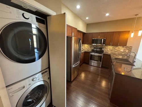 528-4303 1 Street Ne, Calgary, AB - Indoor Photo Showing Laundry Room