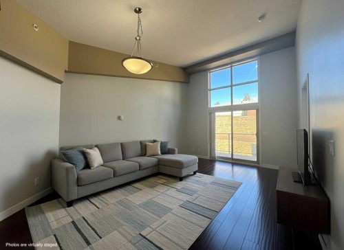 528-4303 1 Street Ne, Calgary, AB - Indoor Photo Showing Living Room
