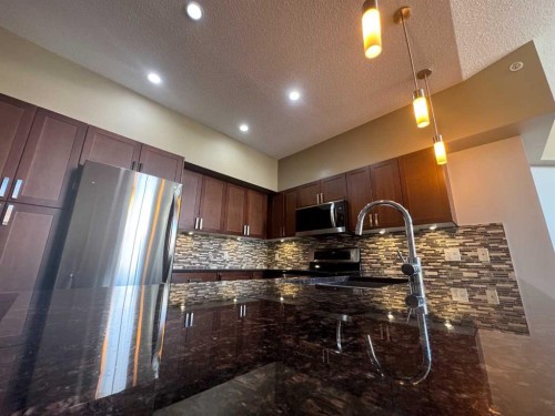 528-4303 1 Street Ne, Calgary, AB - Indoor Photo Showing Kitchen With Double Sink With Upgraded Kitchen