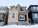 269 Belmont Way Sw, Calgary, AB  - Outdoor With Facade 