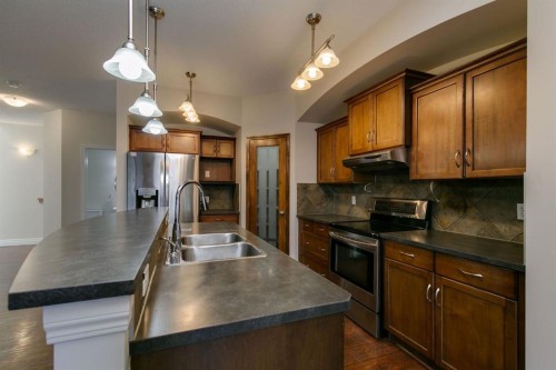 186 Copperfield Close Se, Calgary, AB - Indoor Photo Showing Kitchen With Stainless Steel Kitchen With Double Sink