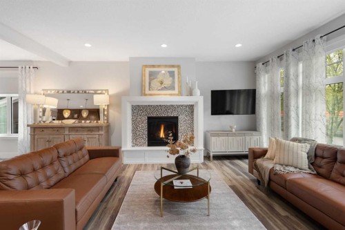 512 Memorial Drive Nw, Calgary, AB - Indoor Photo Showing Living Room With Fireplace