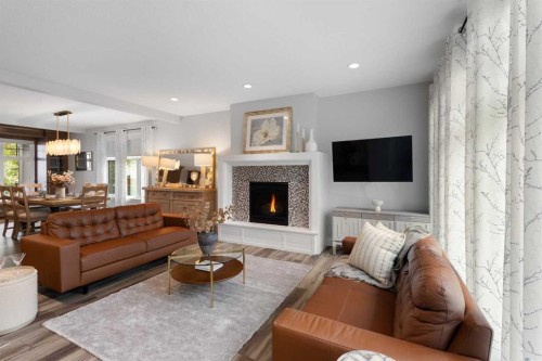 512 Memorial Drive Nw, Calgary, AB - Indoor Photo Showing Living Room With Fireplace