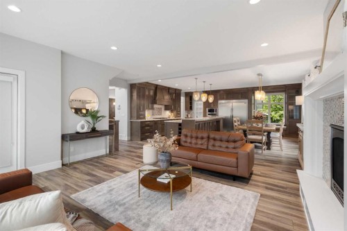 512 Memorial Drive Nw, Calgary, AB - Indoor Photo Showing Living Room With Fireplace