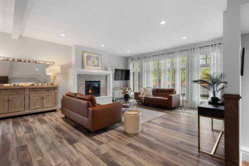 512 Memorial Drive Nw, Calgary, AB - Indoor Photo Showing Living Room With Fireplace